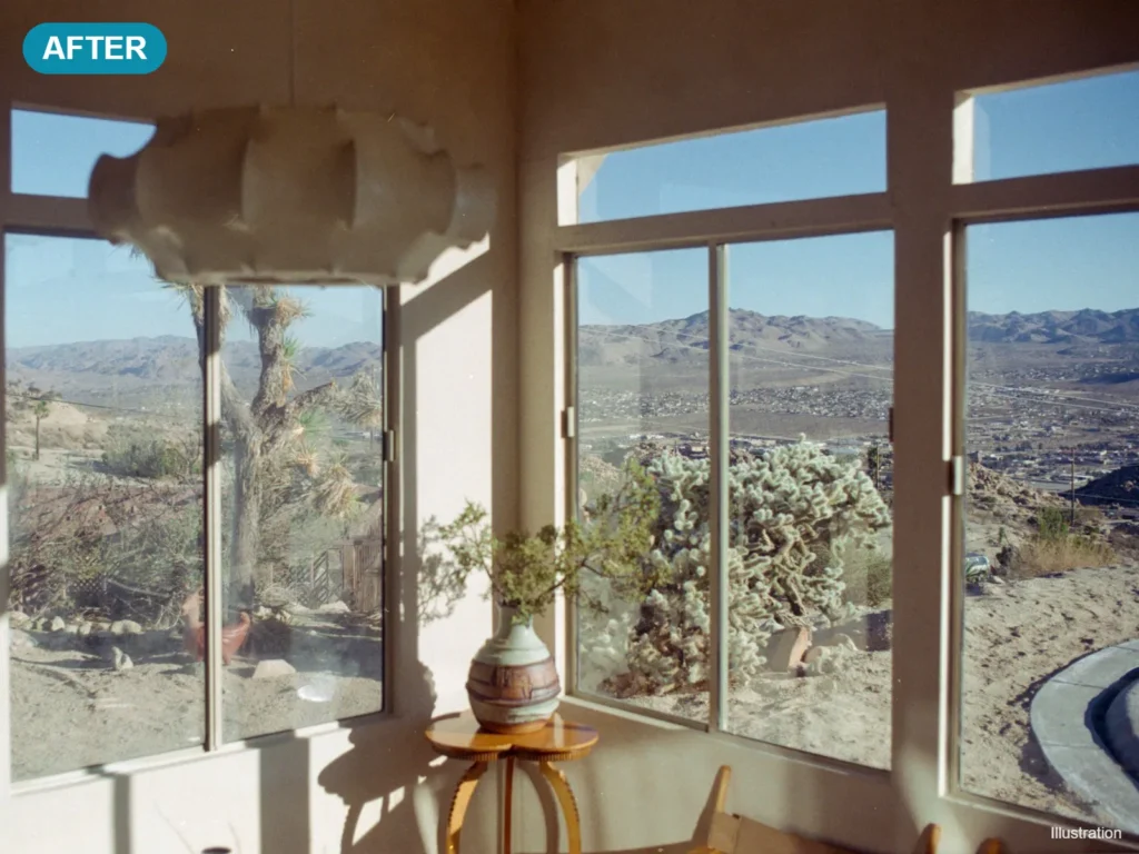 Illustration: the same windows clear and spot-free after cleaning, with a view of the hills